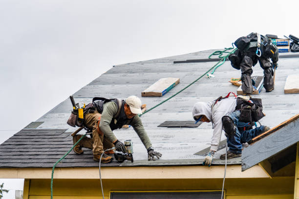 Professional Roof Replacement technician working in Glouster, OH